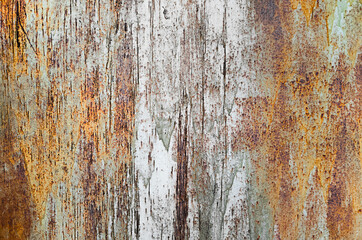 an old metal wall with severe rust