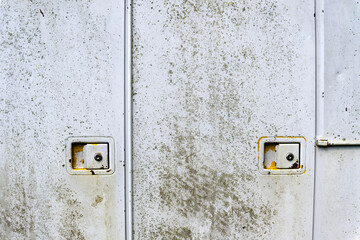 Some damaged truck metal doors