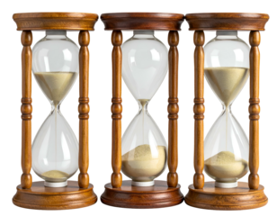 Three antique hourglasses with sand running through