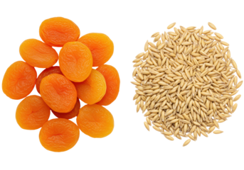 Isolated heap of dried apricots and oats used in breakfast cereals and healthy eating plans