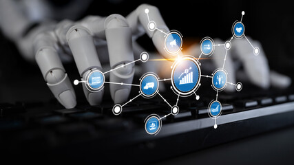 A robotic hand engages with a keyboard, displaying digital graphs and iconic symbols, illustrating the integration of technology and automation in modern business practices. Tessel