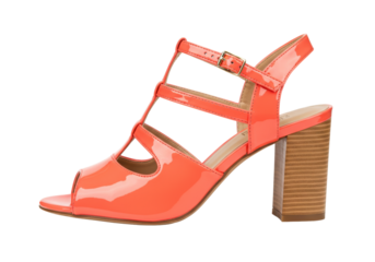 Isolated view of a fashionable high heel sandal against a plain backdrop in vibrant orange hue