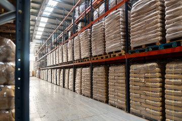 Logistics warehouse interior with sacks stored on shelves