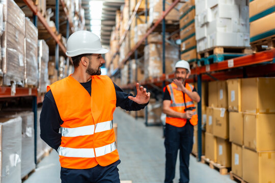 Warehouse workers collaborating in a logistics and distribution center