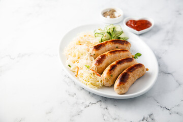 Homemade sausages with sauerkraut