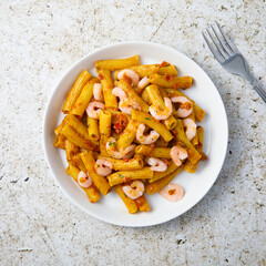 Pasta with shrimps and tomatoes