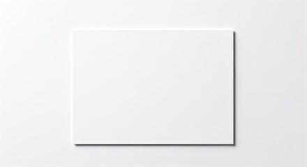 A top-down, minimalist shot of a white rectangular frame on a plain white backdrop