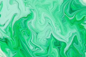 Fototapeta premium Abstract fluid art with flowing green paint creating marble patterns