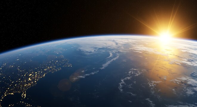 Sunrise over the earth s curvature from space illuminating continents with city lights and vast oceans