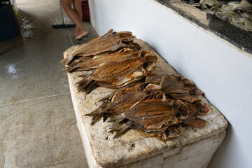 Dried Fish Displayed on Market Table
