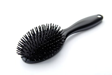 Black oval hairbrush with bristles on white background isolated