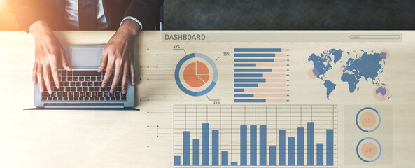 Professional Workspace with Laptop on Desk Featuring Data Analytics Dashboard and Business Metrics Overview Impute.