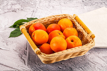 Raw ripe sweet apricots heap