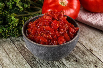 Diced ripe tomato with sauce