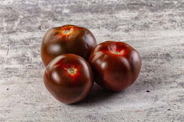 Raw juicy sweet tomato Kumato