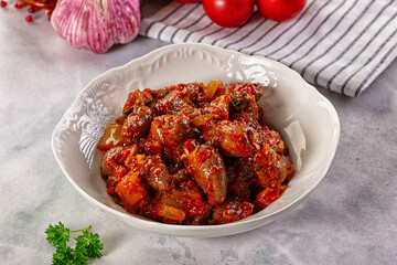 Roasted chicken hearts with vegetables