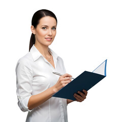 Successful businesswoman taking notes in a meeting, ready to present data results