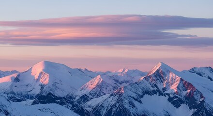 A breathtaking sunset shot over snowy mountain peaks