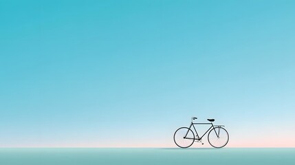 Obraz premium A solitary classic bicycle is positioned on a clean horizon set against a vast calming gradient sky of tranquil blue and soft pink evoking a sense of journey and peace