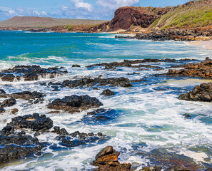 Volcanic Rock and White Sand With Black Rock Cinder Cone on Pohakumauliuli Beach, Molokai, Hawaii, USA