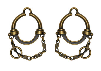 Isolated antique pair of decorative brass metal shackles for bondage for fetish play