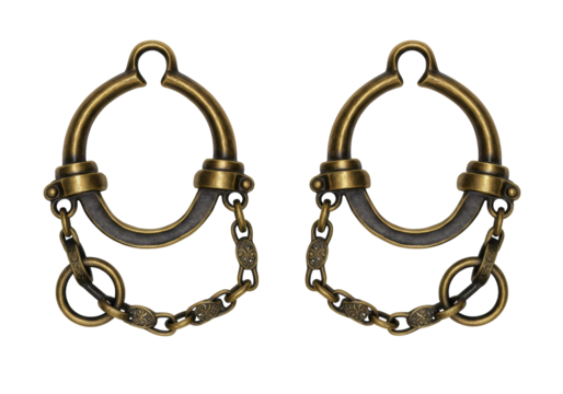 Isolated antique pair of decorative brass metal shackles for bondage for fetish play
