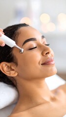 Radiofrequency Facial Treatment, Relaxed African American Woman Receiving An Anti-Aging Skin Lifting Procedure In A Spa, Space For Text