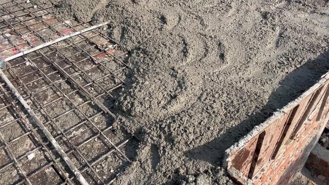 RCC Concrete Pouring at Building Construction Site