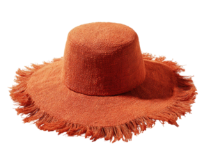 Orange hat with frayed wide brim, isolated