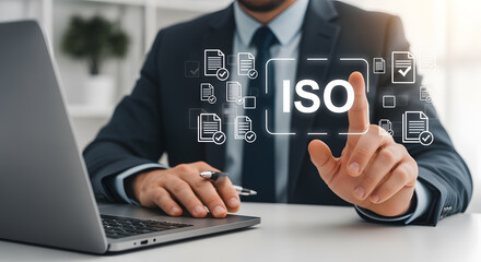 Professional businessman interacts with ISO certification interface, optimizing business standards and quality assurance processes for corporate success.