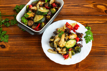Roasted vegetables with zucchini mushrooms and cauliflower in dish