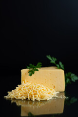 Gourmet dairy cheese with shredded texture and green herbs