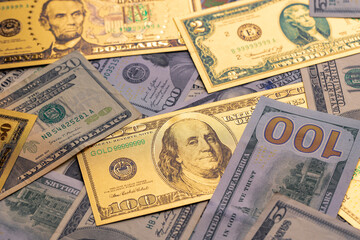 Close Up Collection of Real and Decorative Gold US Dollar Banknotes