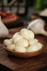 Fresh Shandong Farm Garlic Cloves in Wooden Bowl - Peeled White Garlic Heads Ready for Cooking
