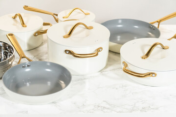 Side Angle of White and Gray Cookware