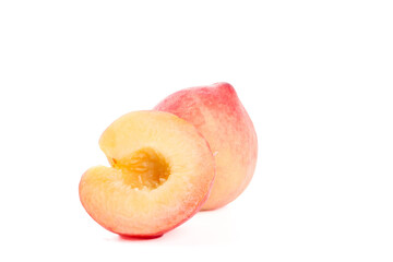 Freshly Cut Ripe Peach Halves Isolated on White Background - Summer Fruit