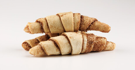 Delicious cinnamon cookies. Three cinnamon cookies on a white background.