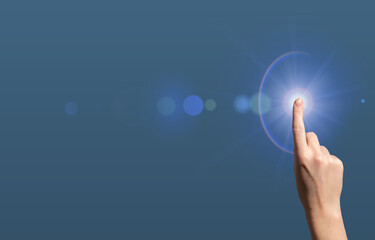 Digital innovation concept. Hand touching glowing blue interface symbolizing intelligence,