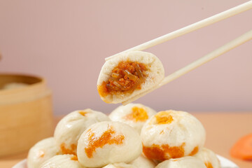 Traditional Xiaolongbao Soup Dumplings from Shengzhou China with Chopsticks - Authentic Chinese Cuisine