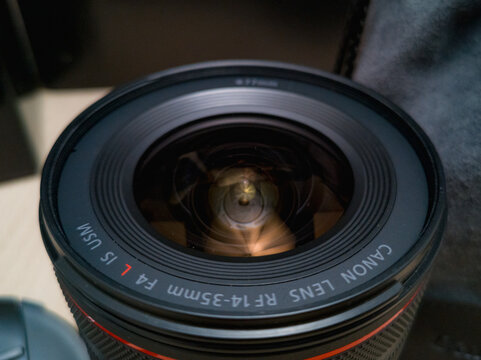 Wroclaw, Poland - September 9 2024: Versatile ultra-wide-angle zoom lens, the Canon RF 14-35mm f/4 L IS USM, designed for mirrorless cameras, offering exceptional image quality and stabilization