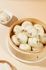 Shengzhou Xiaolongbao Chinese Soup Dumplings with Meat Filling in Bamboo Steamer Traditional Cuisine