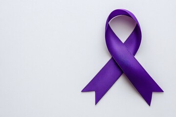 A purple awareness ribbon symbolizes support for various causes, including cancer, domestic violence, and mental health awareness.