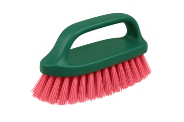 Green plastic scrub brush with pink bristles, a versatile cleaning tool for effective dirt removal and household chores