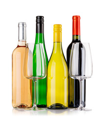 Naklejka premium Different wine bottles and glasses on white background