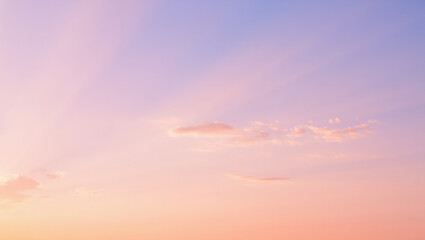 Soft pastel sky with wispy clouds at sunset or sunrise