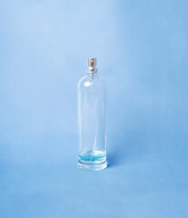 The soft blue tone enhances the bottle’s sleek and luxurious design