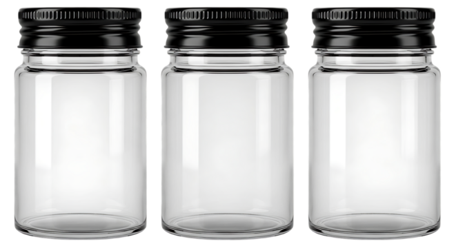 Three empty glass jars with black lids for storage
