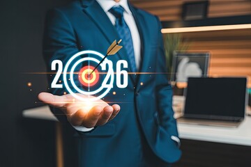New Year 2026 Business Goals and Success Target Concept with Businessman Hand