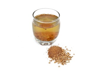 Coriander boiled water in glass on white background. Healthy drink lifestyle 
