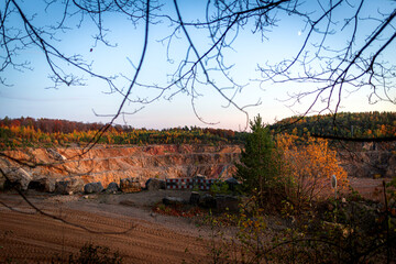 Czatkowice, Poland – October 29, 2025: Autumn foliage frames a panoramic view of a limestone...